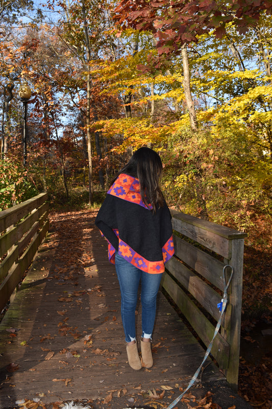Dark grey knitted turtleneck poncho, alpaca poncho with sleeves.