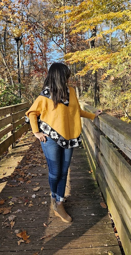 Yellow knitted turtleneck poncho, alpaca poncho with sleeves.
