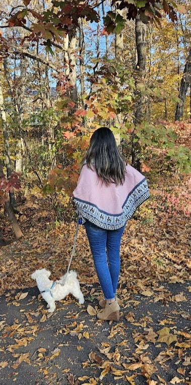 Light pink knitted turtleneck poncho, alpaca poncho with sleeves.
